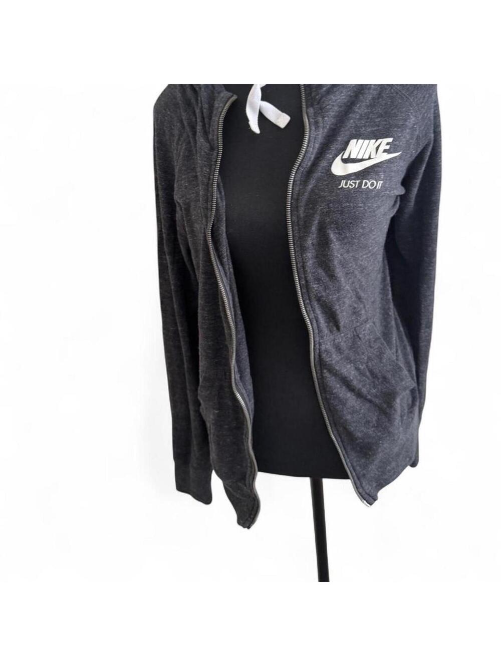Nike women’s grey zip upJacket size large